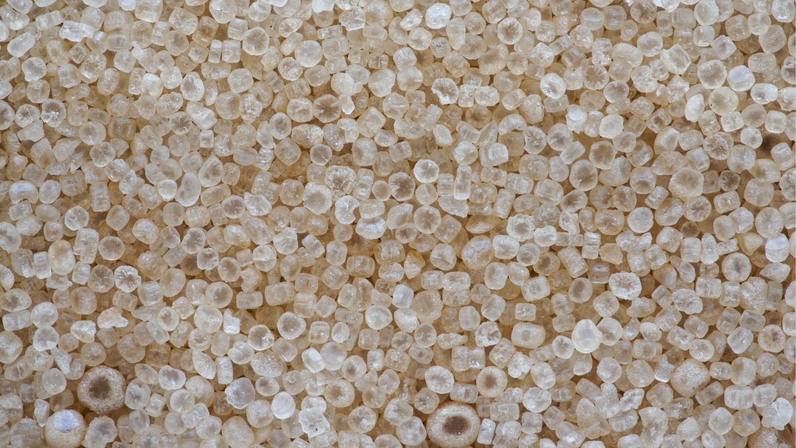 Ammonium Sulfate appears as crystalline granules, sparkling with chemical potential. Its white hue hints at purity, ready to enrich soil with essential nitrogen and sulfur. This soluble fertilizer compound ensures vigorous plant growth, promising bountiful yields in agricultural endeavors.